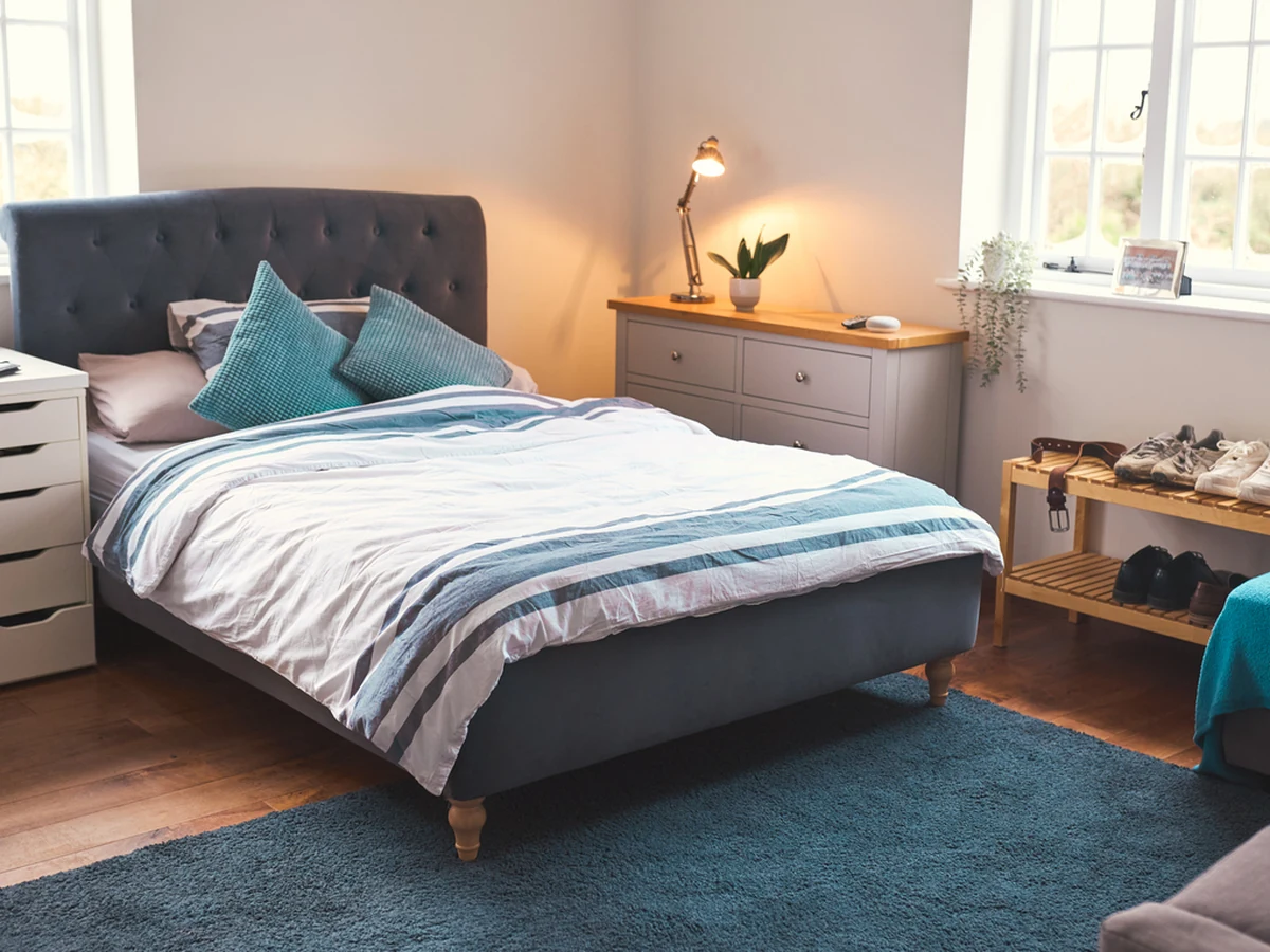 Bedroom painting in Barnstaple - teenage bedroom with teal feature wall painted by Barnstaple Decorators