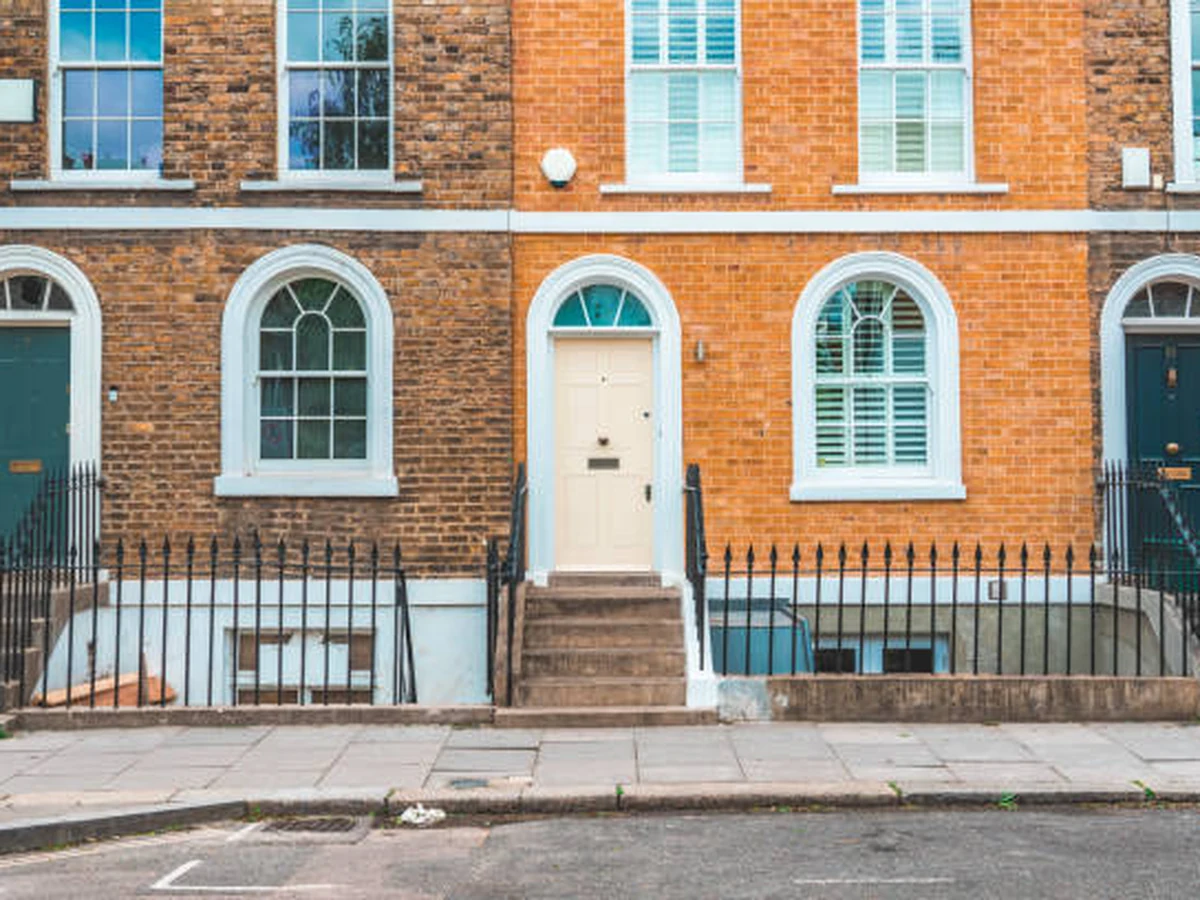 Georgian brick terraced house with masonry painting completed by Barnstaple Decorators