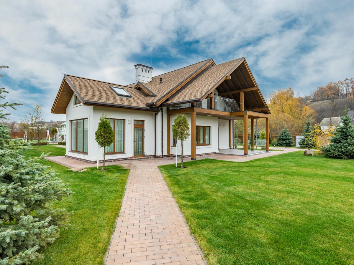White rendered house exterior painted — render painting Barnstaple by Barnstaple Decorators