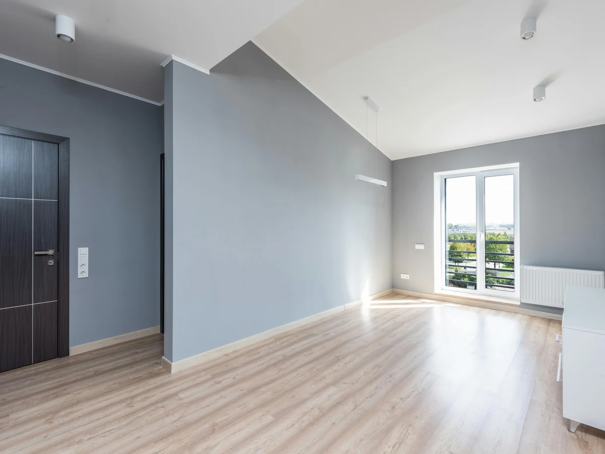 Empty room with two-tone wall painting by Barnstaple Decorators
