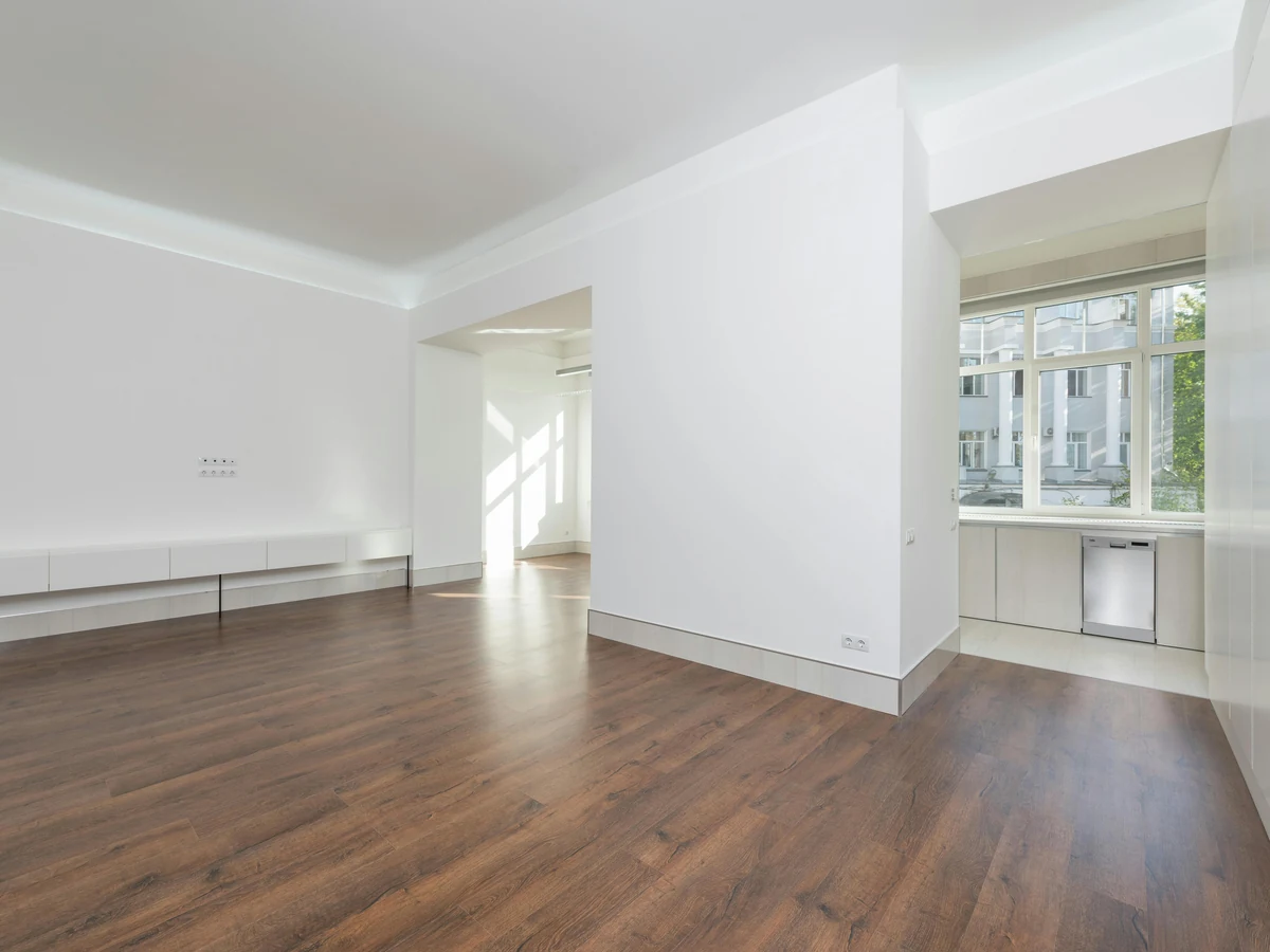 Wall painting in Barnstaple - empty white living room painted by Barnstaple Decorators