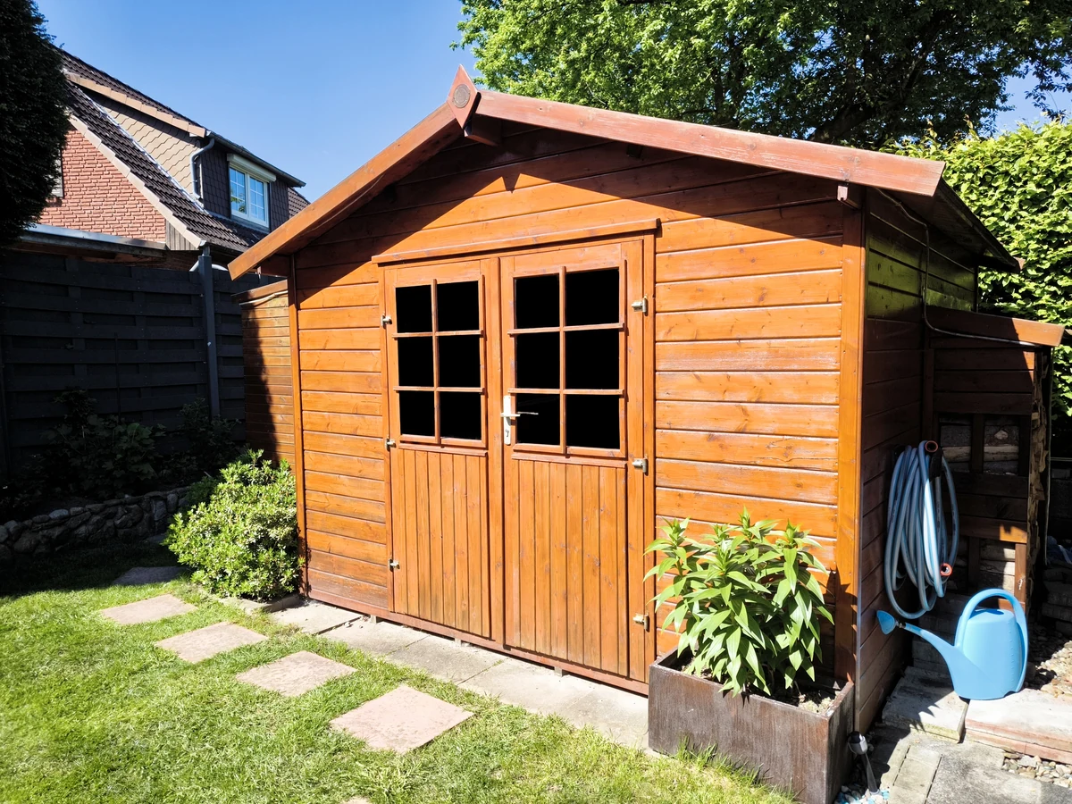 Shed painting in Barnstaple – stained wooden garden structure treated by Barnstaple Decorators
